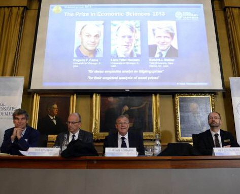 Images of Eugene F Fama, Lars Peter Hansen and Robert J Shiller, the Nobel laureates in Economic Sciences 2013, are displayed at the Royal Swedish Academy of Sciences, Stockholm, on Monday. (AFP-Yonhap News)