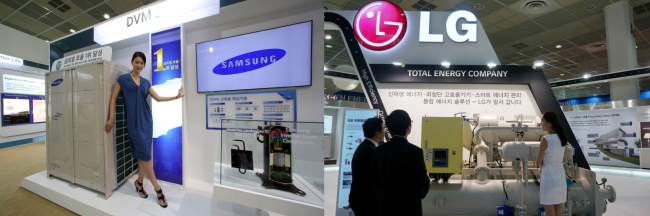 SAVING POWER — Samsung Electronics and LG Electronics showcase green technologies at Energy Korea 2013 at Coex in southern Seoul on Wednesday. Samsung displayed its high-efficient air conditioning system and power-saving home appliances while LG introduced its high-efficient air conditioning and heating system. (Samsung Electronics; LG Electronics)