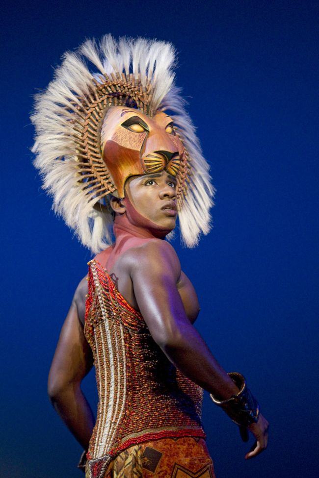 In this theater publicity image released by Disney Theatrical Productions, Dashaun Young portrays Simba in the Broadway production of "The Lion King," in New York. The Lion King? has more reason to roar - it's on pace to end the week as the first Broadway show to earn $1 billion. (AP-Yonhap News)