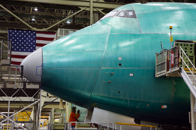 Workers assemble a Boeing Co. 747 jumbo jet at the Boeing Everett Factory in Everett, Washington, in May. Bloomberg