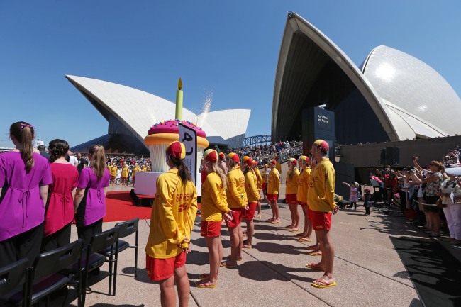 A small fireworks display shoots out from a decorative cupcake during celebrations for the Sydney Opera House’s 40th birthday in Sydney, Sunday.   AP-Yonhap News