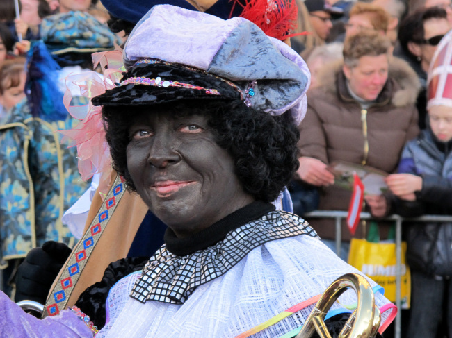 In this Nov. 18, 2012 file photo, a person dressed as “Zwarte Piet” or “Black Pete” attends a parade in Amsterdam, the Netherlands.   AP-Yonhap News
