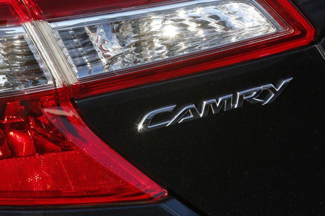 The Toyota Motor Corp. Camry logo is seen on a vehicle displayed for sale at the DCH Auto Group Dealership in Torrance, California.   Bloomberg