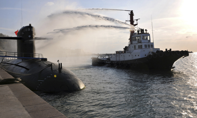 In this photo taken on Oct. 27, 2010 and released by the Chinese navy on Sunday, a Chinese navy nuclear submarine takes part in a nuclear safety drill in Qingdao in China’s Shandong province.   AP-Yonhap News