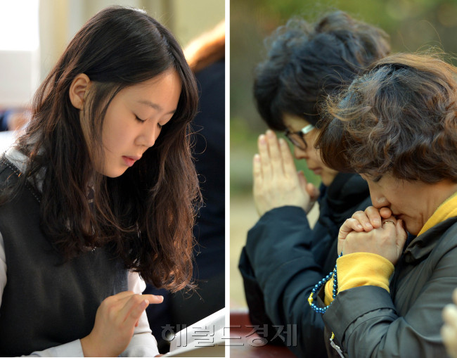 수험생도 학부모도 절실하기는 마찬가지다. 전국적으로 2014학년도 대학수학능력시험이 치러진 7일 오전 서울 안국동 풍문여고 시험장에서 한 수험생이 두 눈을 꼭 감고 시험 전 마지막 정리를 하고 있다(왼쪽). 그 시간 서울 명동성당에선 학부모가 두 손을 모으고 수험생을 위해 기도하고 있다.