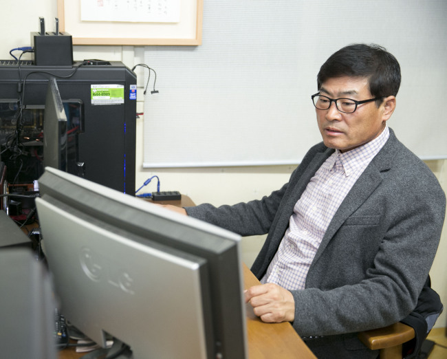 CEO Park In-soo works at his office in Gimpo, west of Seoul.   YUJIN E-Tech