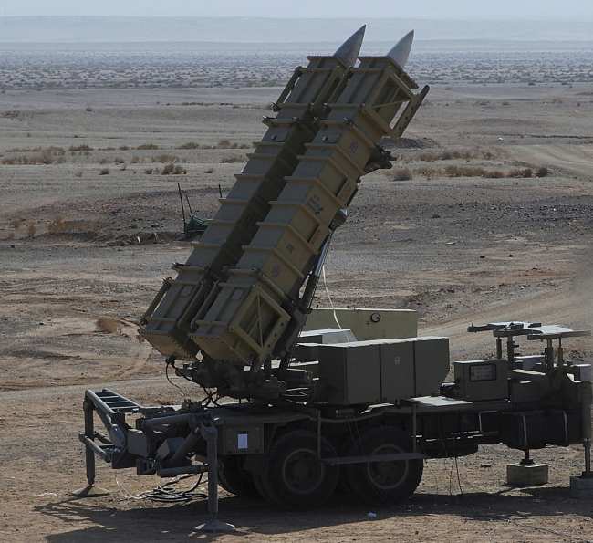 This photo released on Saturday by the Iranian Defense Ministry claims to show Sayyad-2 missiles prepared to be launched in an undisclosed location in Iran.   AP-Yonhap News