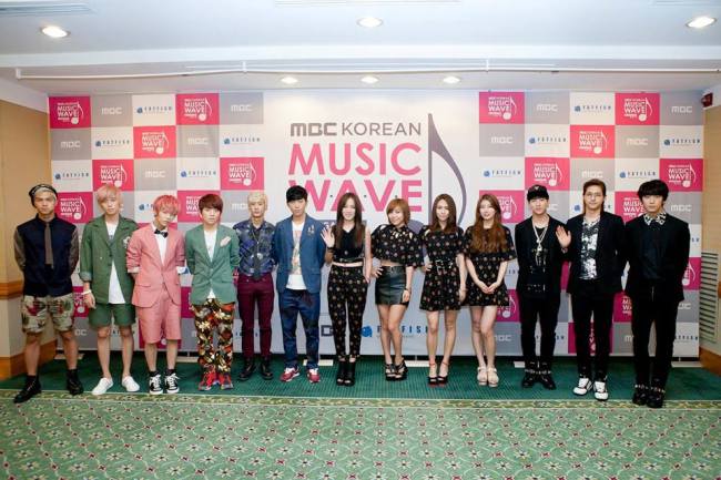 K-pop artists, members of Teen Top, Miss A, B1A4, pose during a press conference for MBC Korean Musicwave in Seoul on Aug. 20.   MBC Korean Musicwave in Singapore official site
