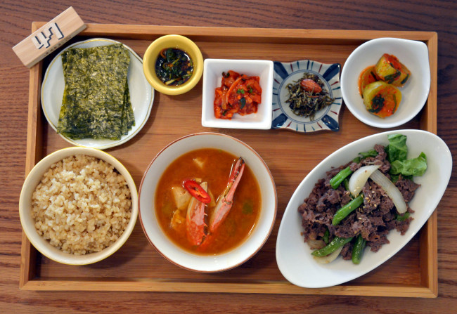 Only 100 meals are sold daily, with a numbered tag (top right) used to keep track of how many have been served.
(Kim Myung-sub/The Korea Herald)