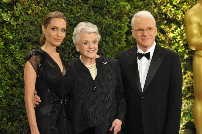 From left: Angelina Jolie, Angela Lansbury and Steve Martin are seen on the red carpet at the 2013 Governors Awards on Saturday in Los Angeles.   AP-Yonhap News
