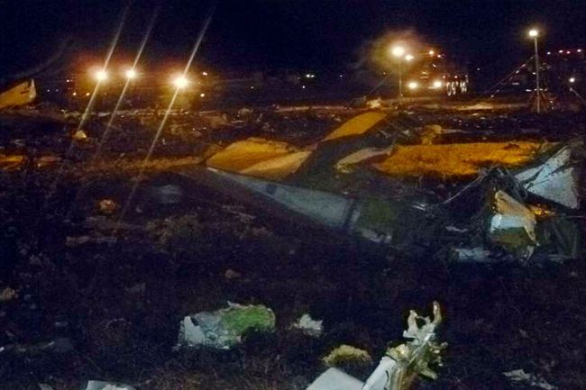 This handout picture taken and released by Russia's Emergency Ministry on Sunday shows the crash site of a Boeing 737 airplane at the airport of Kazan, western Tatarstan. (AFP-Russian Emergency Ministry)