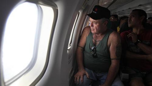 Former NYPD detective Martin Gillespie and plane mechanic Rodrigo Cabanero are en route from Cebu to Tacloban to find their families on Nov. 14.   The Straits Times