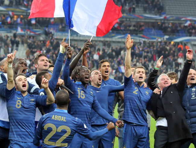 France players celebrate after beating Ukraine.   AP-Yonhap News