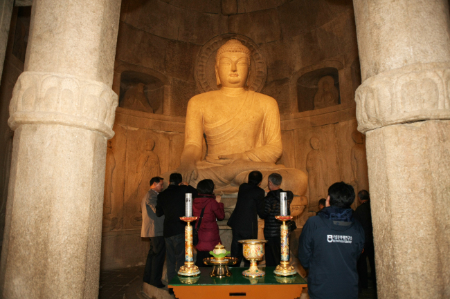 A Cultural Heritage Administration inspection team examines the Seokguram Grotto in Gyeongju, North Gyeongsang Province, on Nov. 14 after cracks were found in the UNESCO-listed cultural heritage site that dates back to the eighth century.   Yonhap News