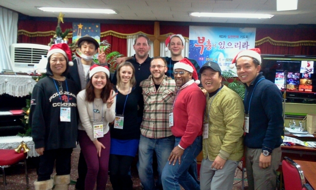 Volunteers pose at last year’s HOPE Christmas for Children event at Goodtree Children’s Center.   HOPE
