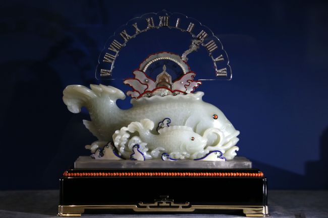 A carp-shaped clock designed by Cartier in 1925 is displayed during the exhibition dedicated to French luxury watchmaker-jeweler Cartier entitled “Cartier, le style, l’histoire” (Cartier, style and history) at the Grand Palais in Paris on Sunday.   AFP-Yonhap News