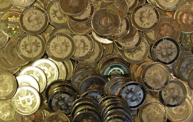 This photo shows Bitcoin tokens.   AP-Yonhap News