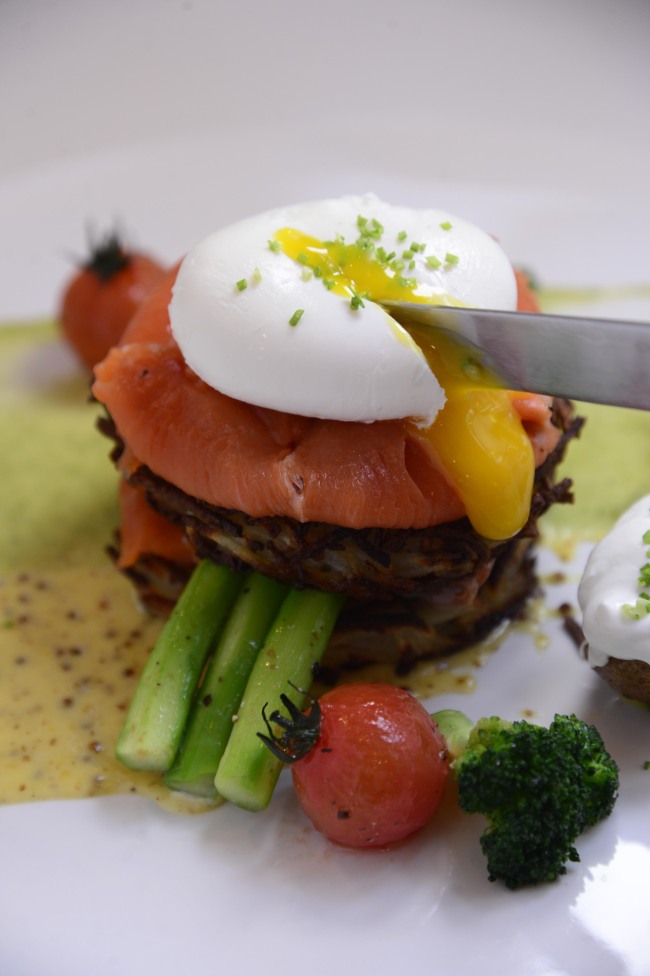 Smoked salmon with potato rosti and poached egg takes its inspiration from Eggs Benedict.   Park Hae-mook/The Korea Herald