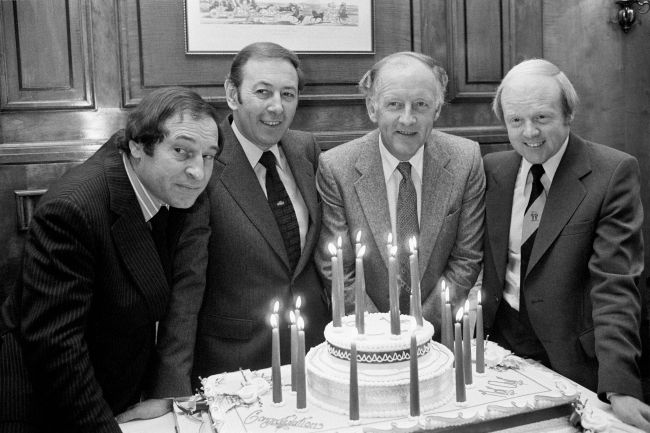 This file photo dated Oct. 10, 1979, shows “BBC Grandstand” presenters (left to right) Cliff Morgan, David Coleman, Frank Bough and Tony Gubba at a celebration of 21 years of the BBC sports program.   AP-Yonhap News