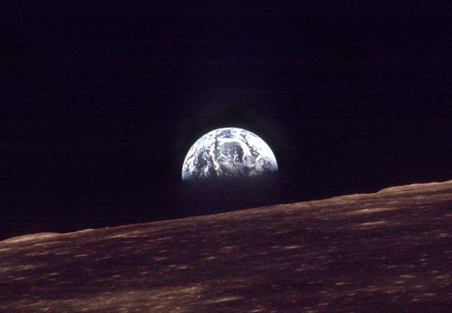 The Earth shines over the moon’s horizon on Dec. 24, 1968.   AP-Yonhap News