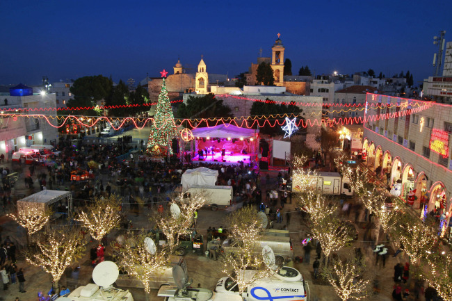 Manger Square, outside the Church of the Nativity, traditionally believed by Christians to be the birthplace of Jesus Christ, in the West Bank town of Bethlehem on Tuesday   AP-Yonhap News