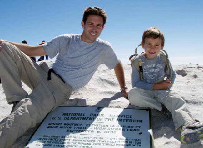 This July 26, 2011, file photo provided by Kevin Armstrong shows Kevin and his son, Tyler, after reaching the summit of Mount Whitney in Sierra Nevada, California.   AP-Yonhap News
