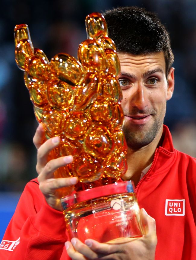 Novak Djokovic poses with his trophy on Saturday.   AFP-Yonhap News