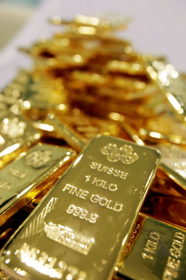 Gold bars are arranged for a photo at the YLG Bullion International Co. headquarters in Bangkok.  Bloomberg