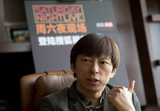 Sohu chairman and CEO Charles Zhang speaks to journalists during a press conference at the Sohu Media Plaza in Beijing on Thursday. AP-Yonhap News