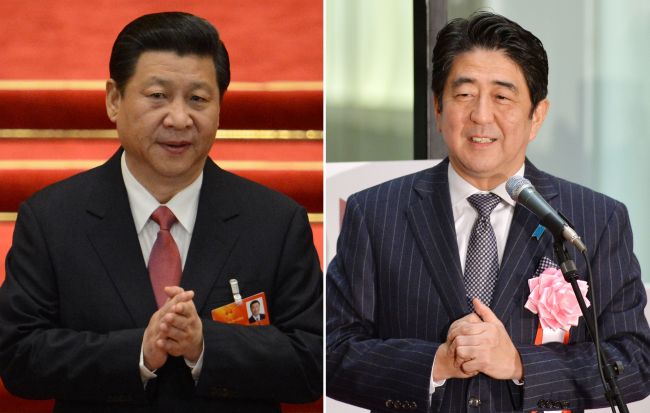 Chinese President Xi Jinping (left) and Japanese Prime Minister Shinzo Abe
AFP-Yonhap News