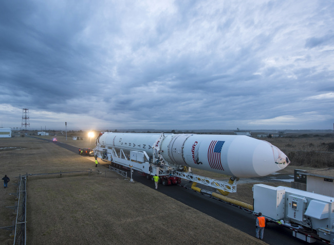 An Orbital Sciences Corporation Antares rocket is seen as it is rolled out to launch Pad-0A at NASA’s Wallops Flight Facility, Wallops Island, Virginia, Sunday.   AP-Yonhap News