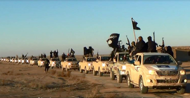 This image posted on a militant website on Tuesday, which is consistent with AP reporting, shows a convoy of vehicles and fighters from the al-Qaida- linked Islamic State of Iraq and the Levant fighters in Iraq’s Anbar province.   AP-Yonhap News