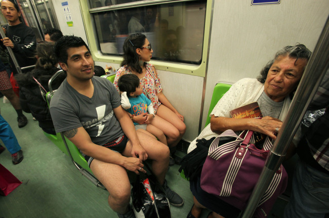 Commuters participate in the annual “No Pants Subway Ride” in Mexico City on Sunday.   AP-Yonhap News