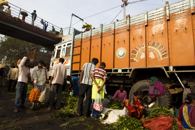Produce being sold at a market in Kolkata, India.   Bloomberg