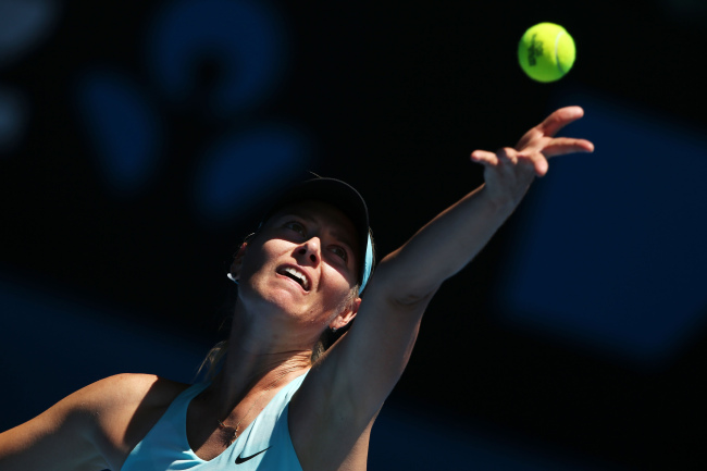 Maria Sharapova serves against Karin Knapp at the Australian Open on Thursday.   Getty-Yonhap News