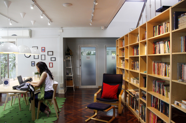 A woman works at the coworking space Muchroom in Bangkok, Thailand.   The Nation