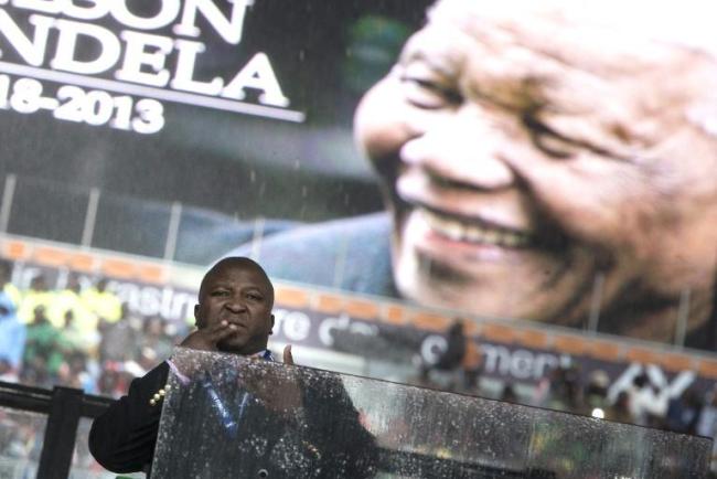 The bogus sign language interpreter for the memorial service at FNB Stadium in Johannesburg, South Africa, Dec. 10.    AFP