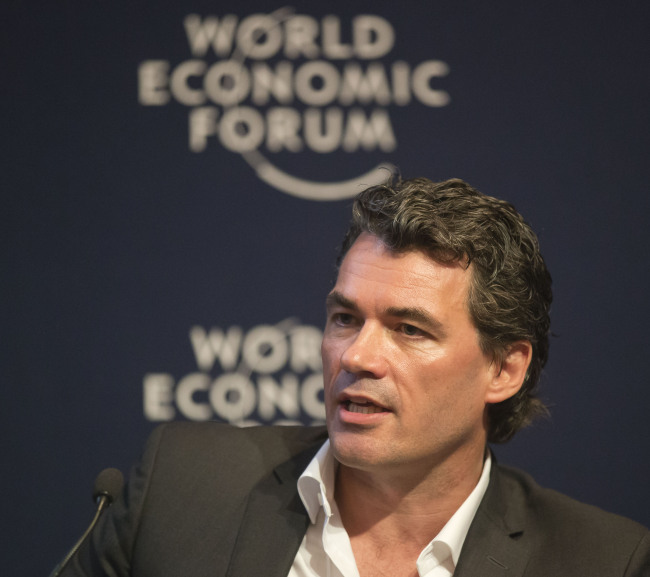 BT Group CEO Gavin Patterson speaks during a session at the World Economic Forum in Davos on Wednesday.   AP-Yonhap News