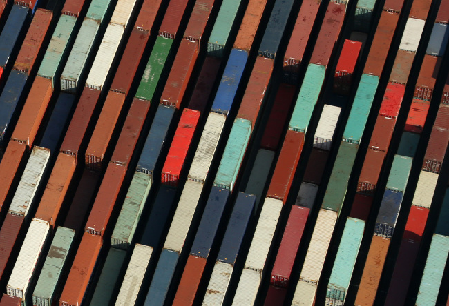 Shipping containers stacked at the Aomi Container Terminal in Tokyo.   Bloomberg