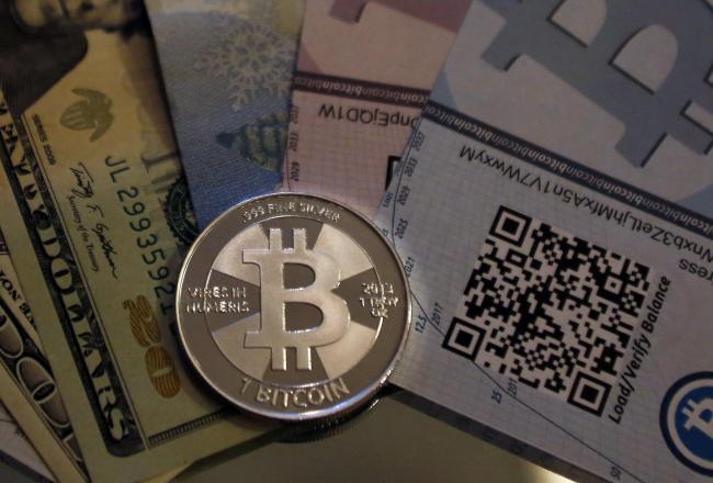 A mock Bitcoin is shown in this photo illustration in Sandy, Utah.   Bloomberg
