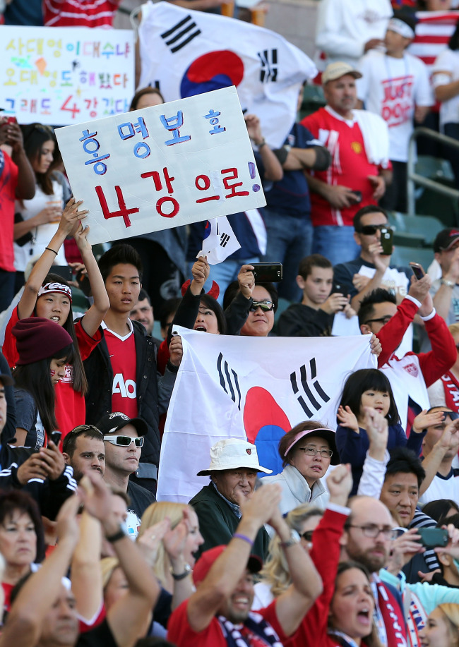 Korean fans support the national team on Saturday.   Yonhap