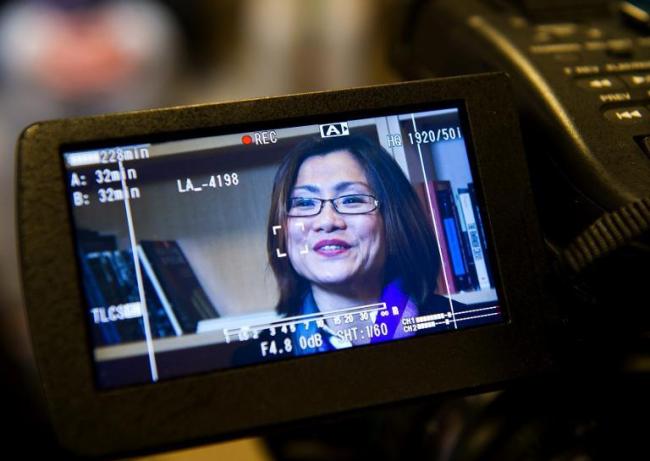 Shandra Woworuntu, human trafficking survivor and activist, is seen on a camera monitor during an interview with AFP, at Humanity United in Washington, D.C., on Jan. 28.   AFP