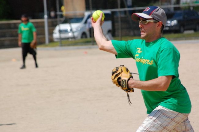 An expat throws a pitch for the Swingers in the Daegu Softball League. DSL