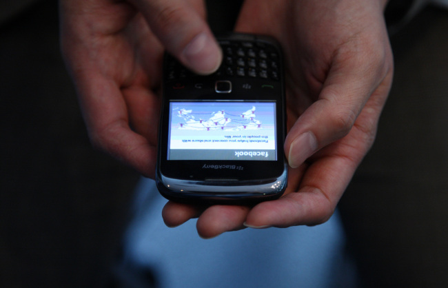 The Facebook website is displayed on a Blackberry 9900 smartphone in Tokyo.   Bloomberg