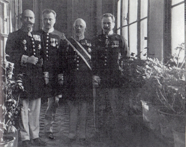 Sergey Chirkin (left), court counselor of the Russian legation in Korea, poses for a photo with General Counselor A. Somov (second from right) at the former Russian diplomatic facility in Jeong-dong, downtown Seoul, in this undated 1911 photo.   Russian Embassy