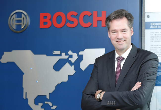 Markus Heyn, president of Bosch’s diesel systems division, poses at the auto parts maker’s  Korean headquarters in Yongin, Gyeonggi Province, on Friday.   Bosch Korea