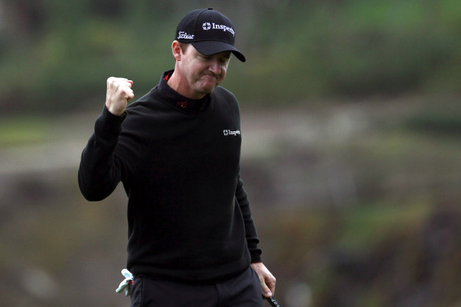 Jimmy Walker celebrates his one-stroke victory on the 18th green on Sunday.   USA Today-Yonhap