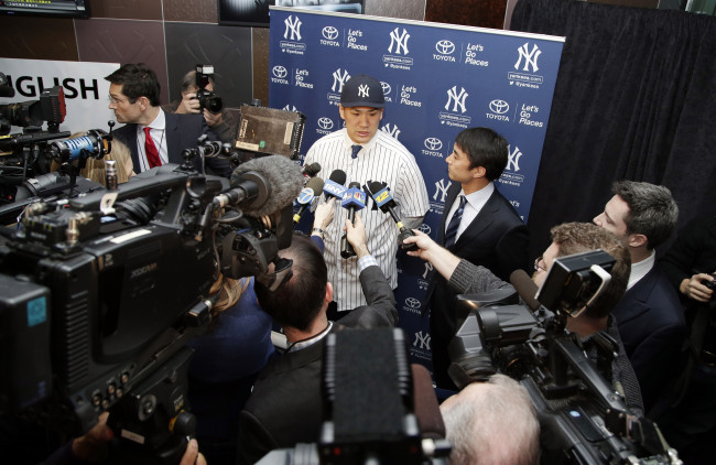 New York Yankees pitcher Masahiro Tanaka talks to the media on Tuesday.   USA Today-Yonhap