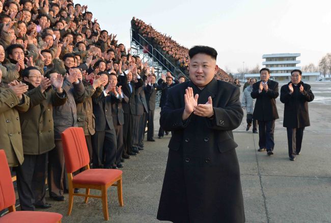 North Korean leader Kim Jong-un visits participants of a national agriculture competition in this undated photo released by the North’s Korean Central News Agency on Feb. 10.   Yonhap