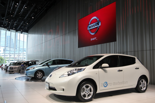 Nissan Leaf vehicles are on display at the carmaker’s Yokohama showroom near Tokyo. (Bloomberg)